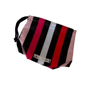 NWOT VICTORIA’S SECRET PINK AND RED STRIPED WATERPROOF COSMETIC BAG💗